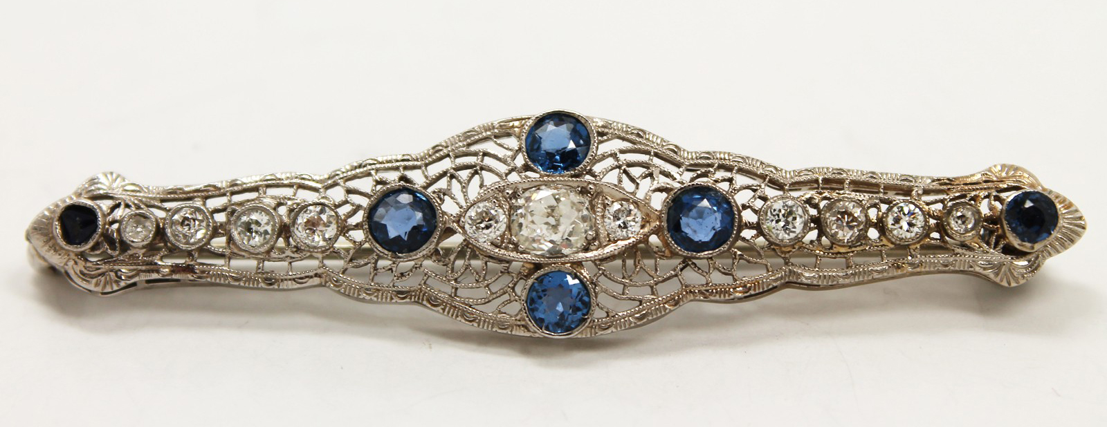 Antique Art Deco White Gold Filigree Diamond and Sapphire Brooch